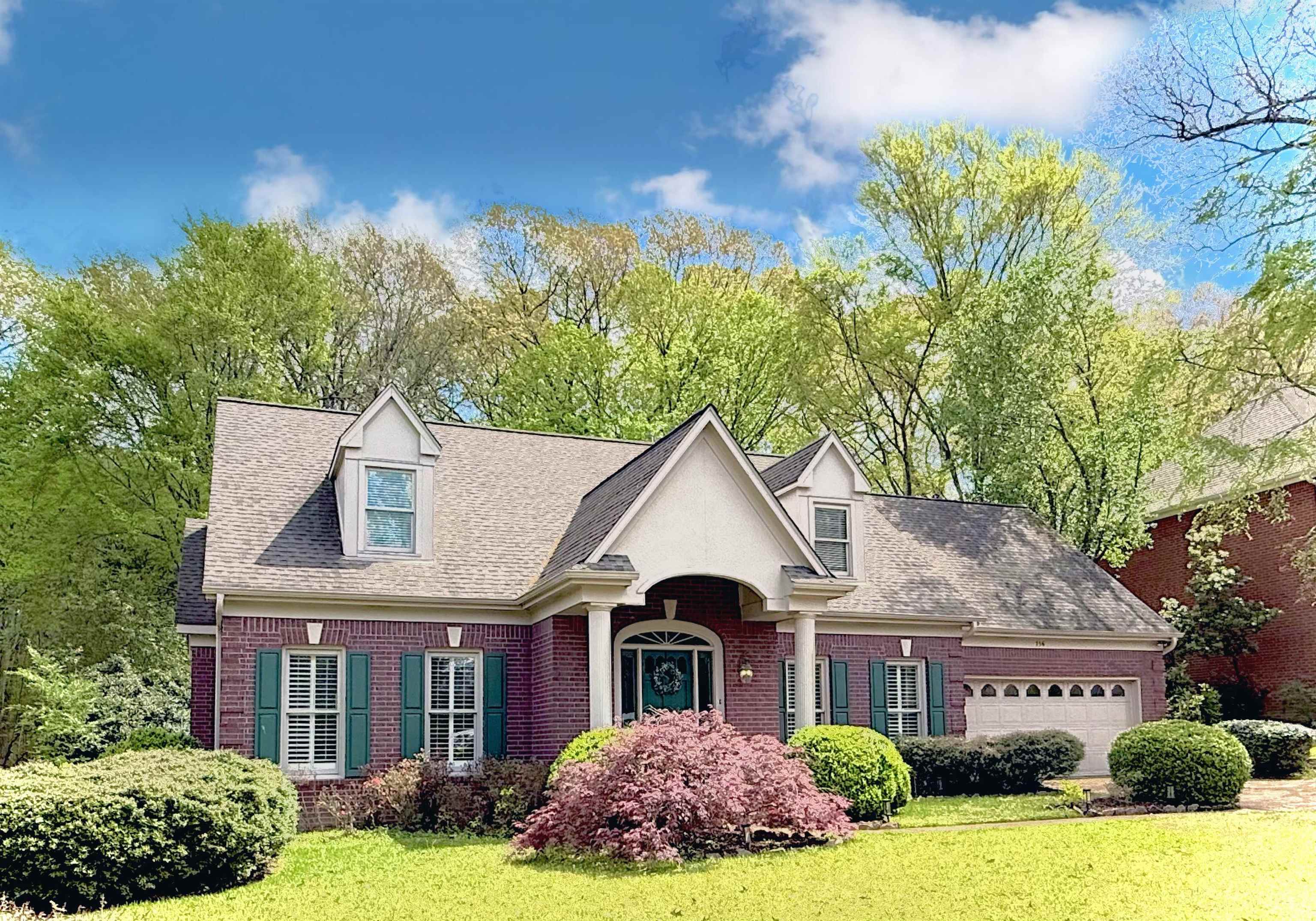 756 Crestover Drive Collierville, TN 38017 - Photo 1 of 38 a front view of a house with yard and green space