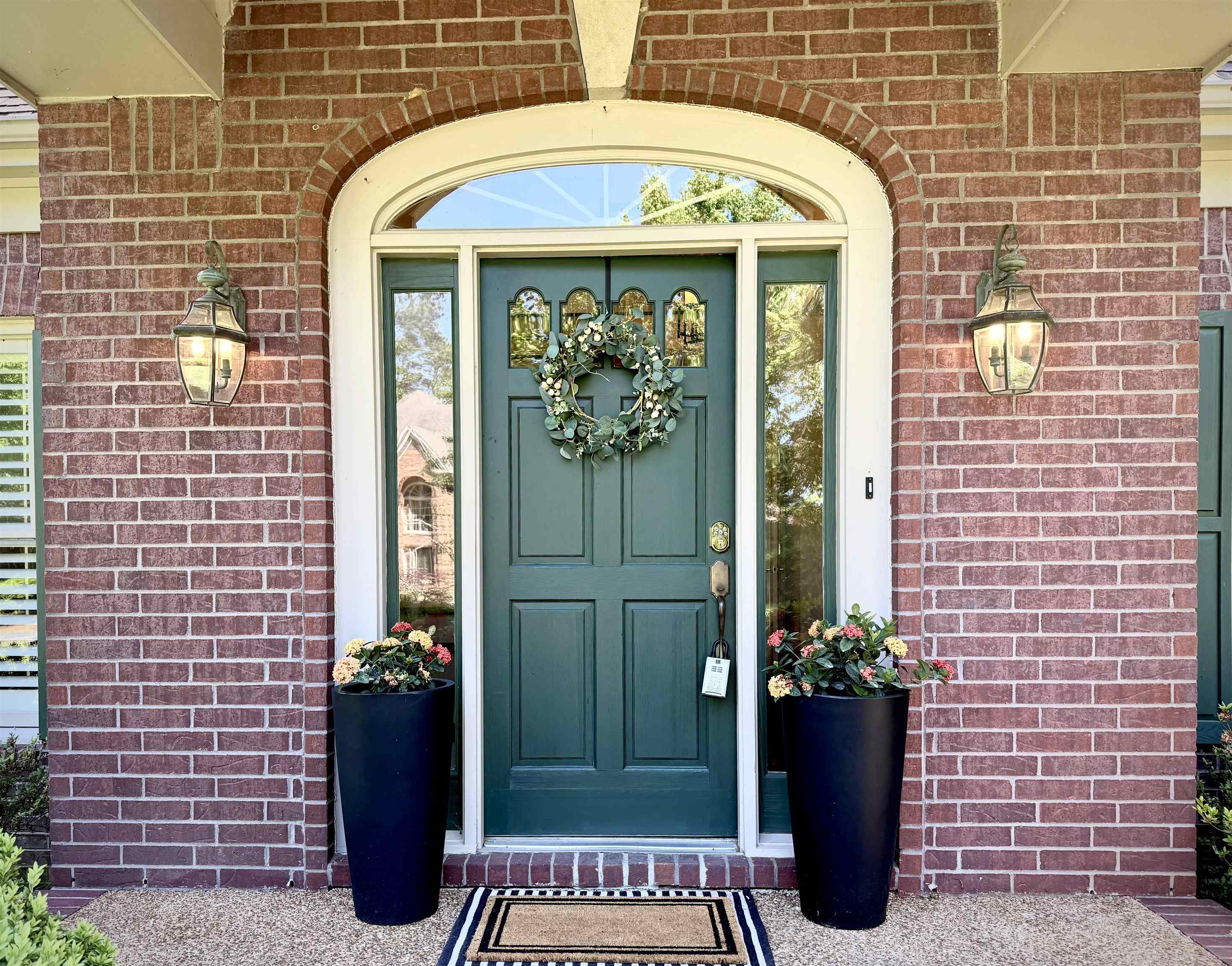 756 Crestover Drive Collierville, TN 38017 - Photo 2 of 38 a front view of a house with a garden