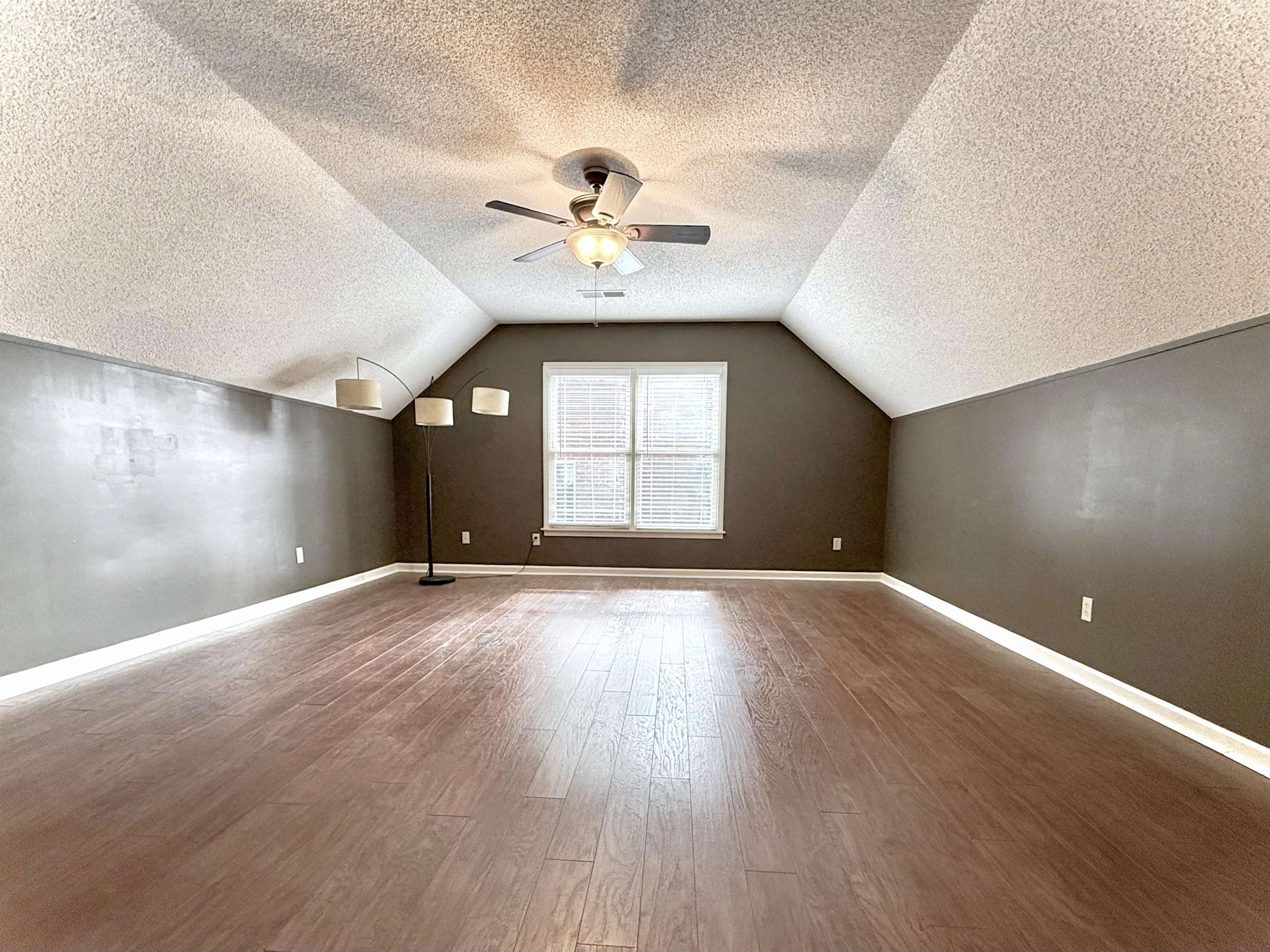 756 Crestover Drive Collierville, TN 38017 - Photo 28 of 38 a view of an empty room with window and wooden floor