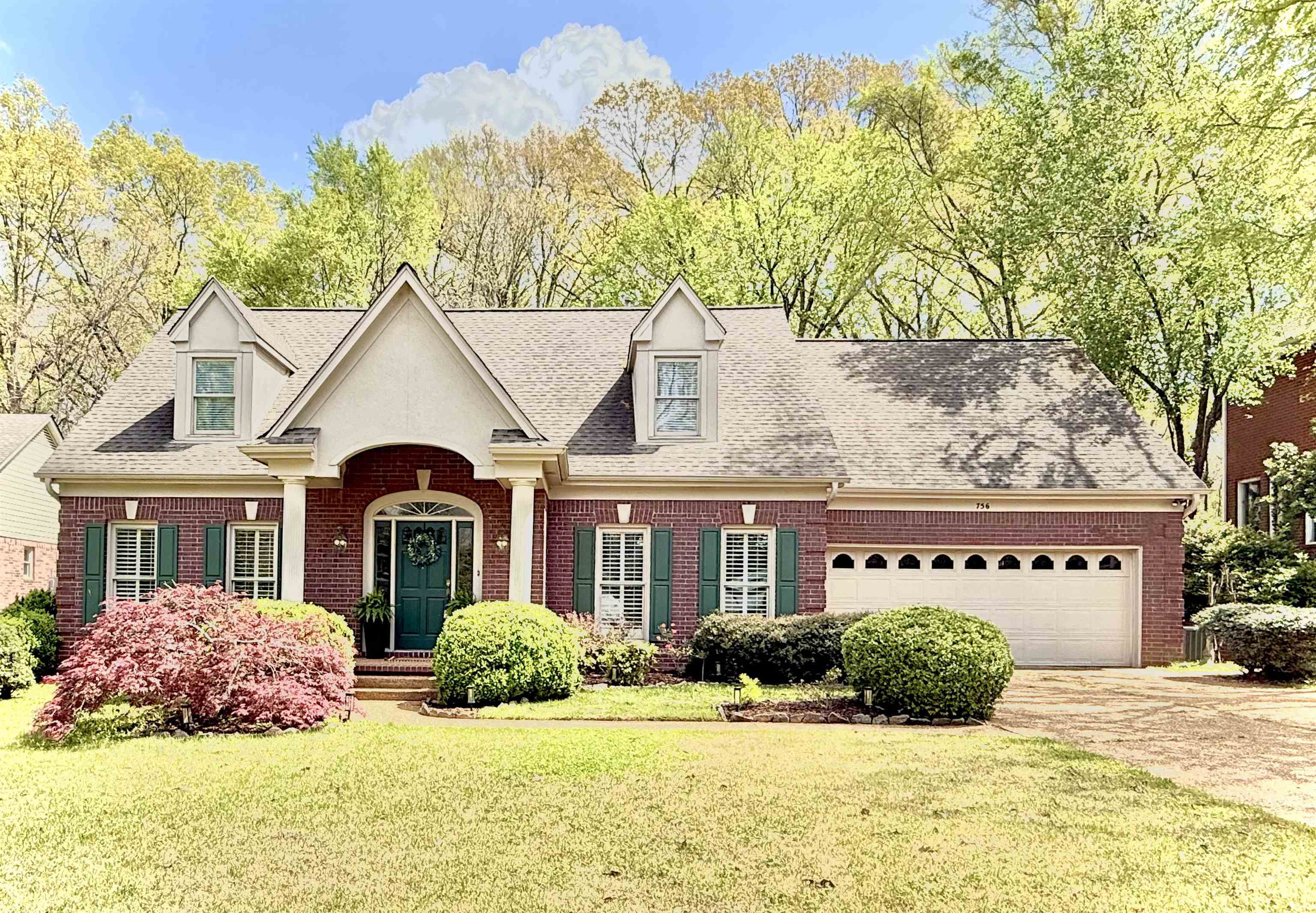 756 Crestover Drive Collierville, TN 38017 - Photo 37 of 38 a front view of a house with a yard