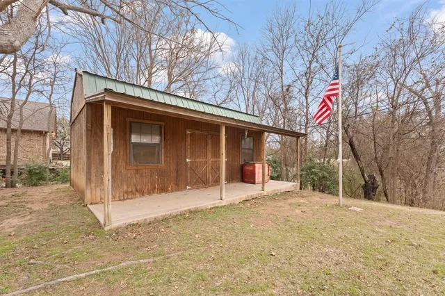 a house with trees in front of it