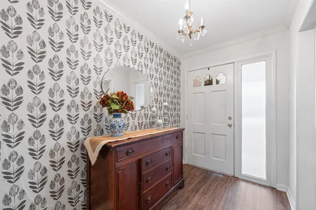 walk in closet with wooden floor