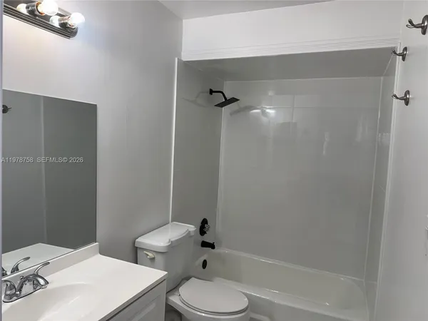 a view of a lake with a yard