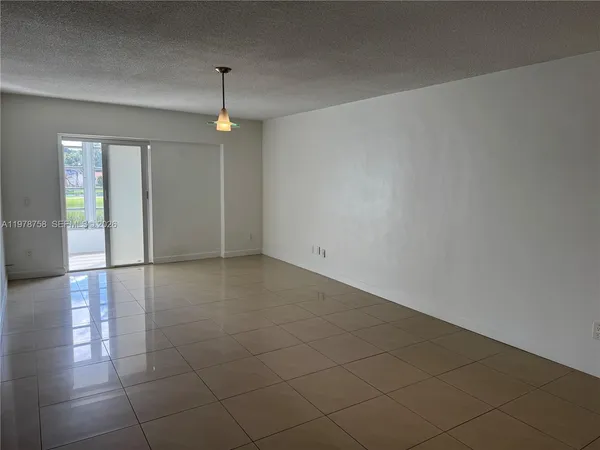 an aerial view of a house with swimming pool