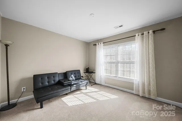a bathroom with a sink vanity and a mirror