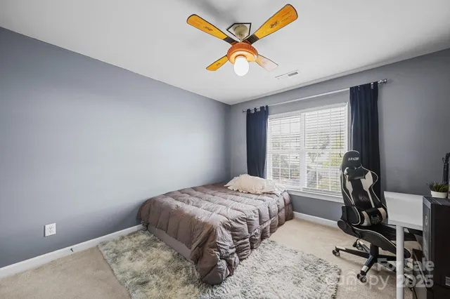a view of a hallway with staircase