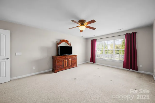 a bathroom with double vanity sink and a mirror