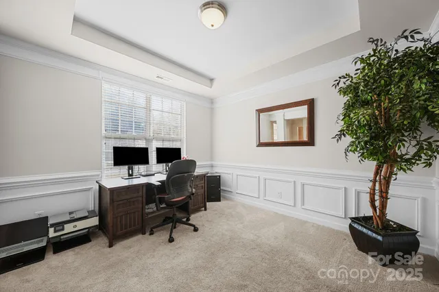 a kitchen with a stove a refrigerator and a sink
