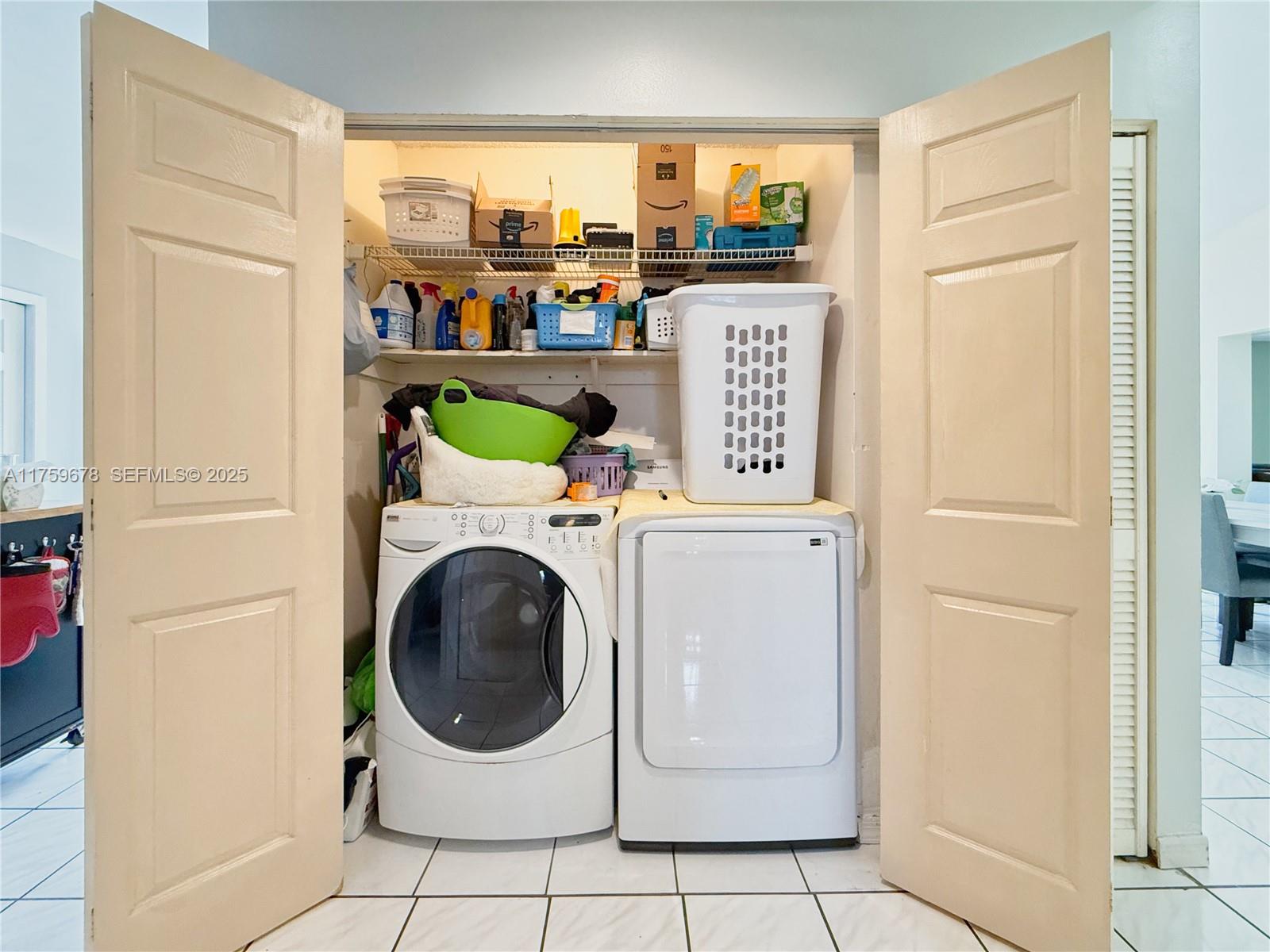 20520 Southwest 124th Place Miami, FL 33177 - Photo 17 of 34 a utility room with dryer and washer