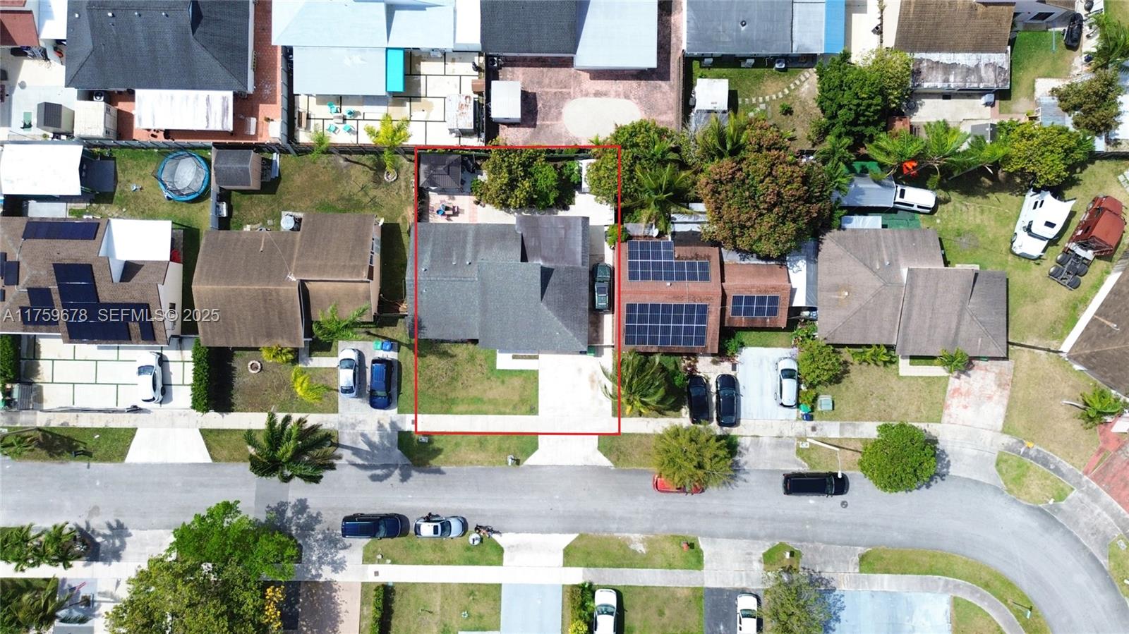 20520 Southwest 124th Place Miami, FL 33177 - Photo 30 of 34 a aerial view of multiple houses with yard