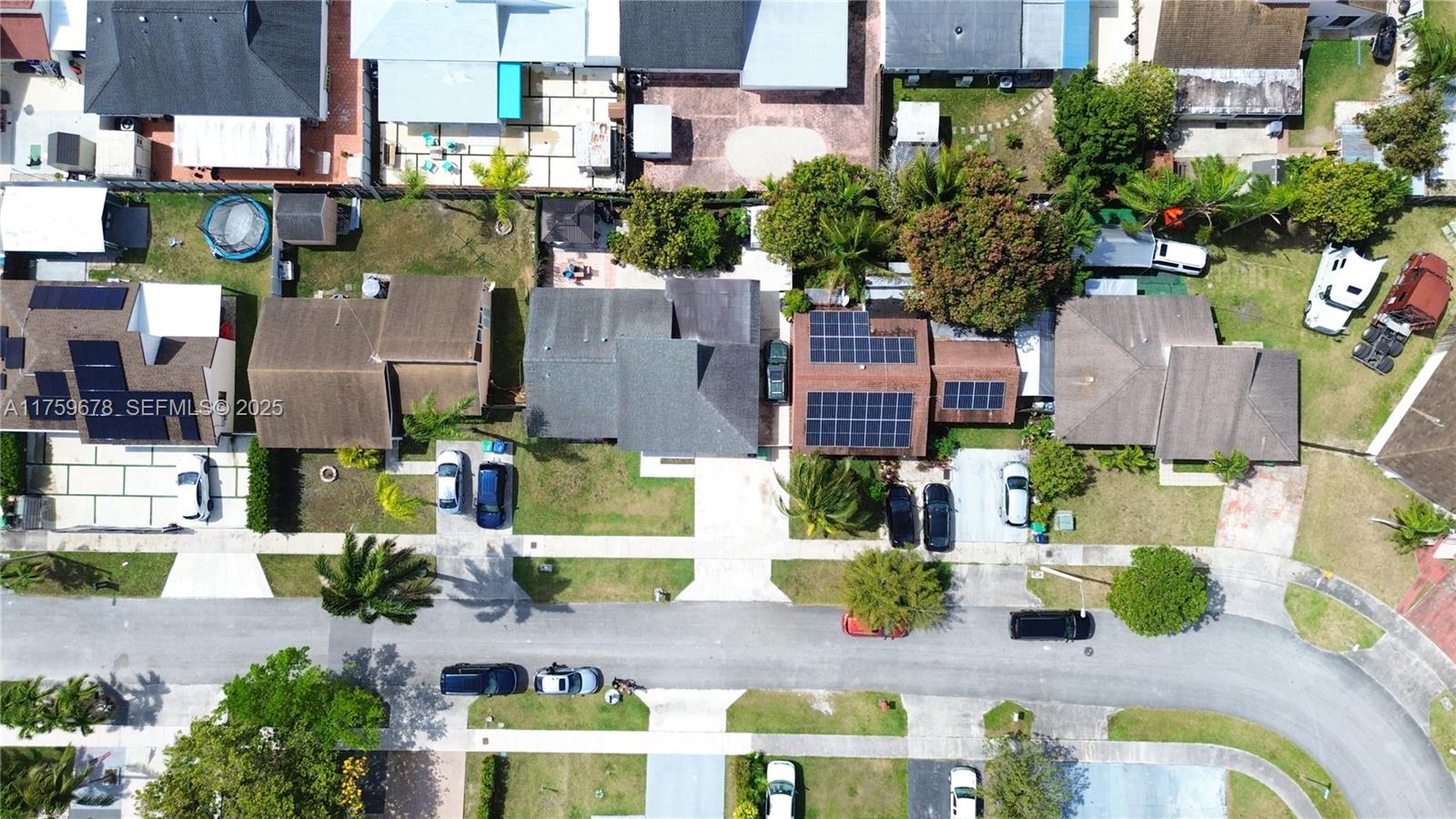 20520 Southwest 124th Place Miami, FL 33177 - Photo 33 of 34 a aerial view of multiple houses with yard