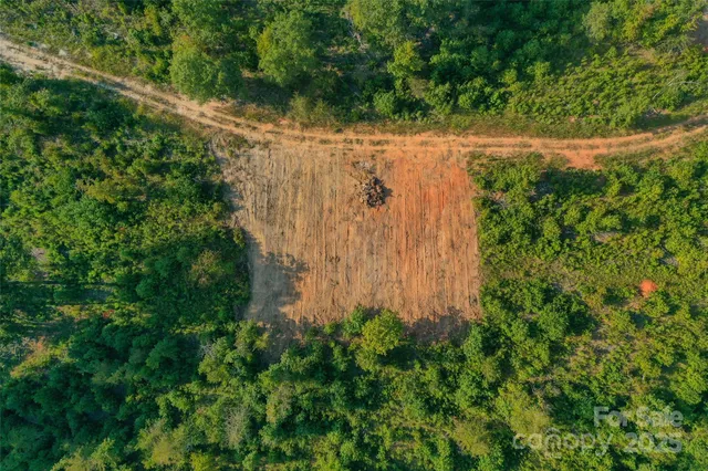 a view of a lake with a yard