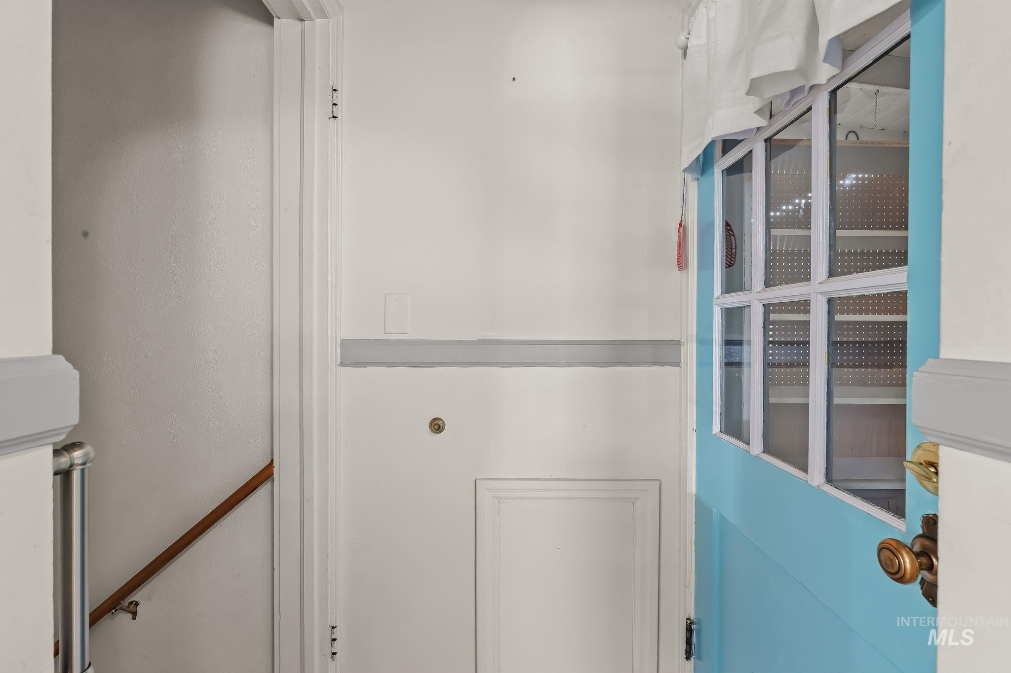420 4th Street Lewiston, ID 83501 - Photo 19 of 38 Light blue door with glass paneling and brass hardware