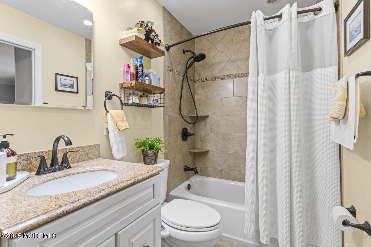 31 Cedar Avenue South Amboy, NJ 08879 - Photo 14 of 41 a bathroom with a granite countertop sink toilet and shower