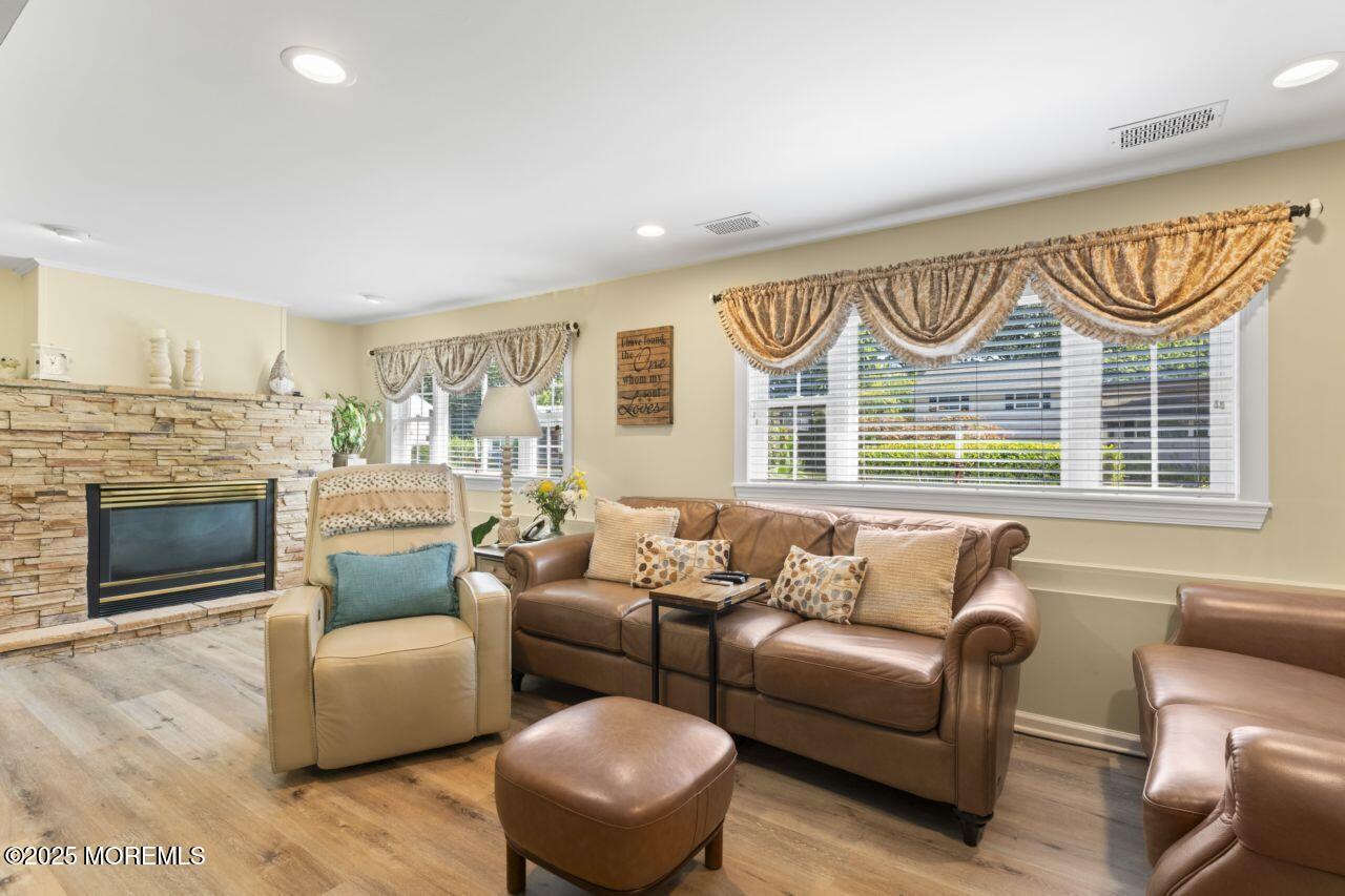 31 Cedar Avenue South Amboy, NJ 08879 - Photo 17 of 41 a living room with furniture a fireplace and a large window