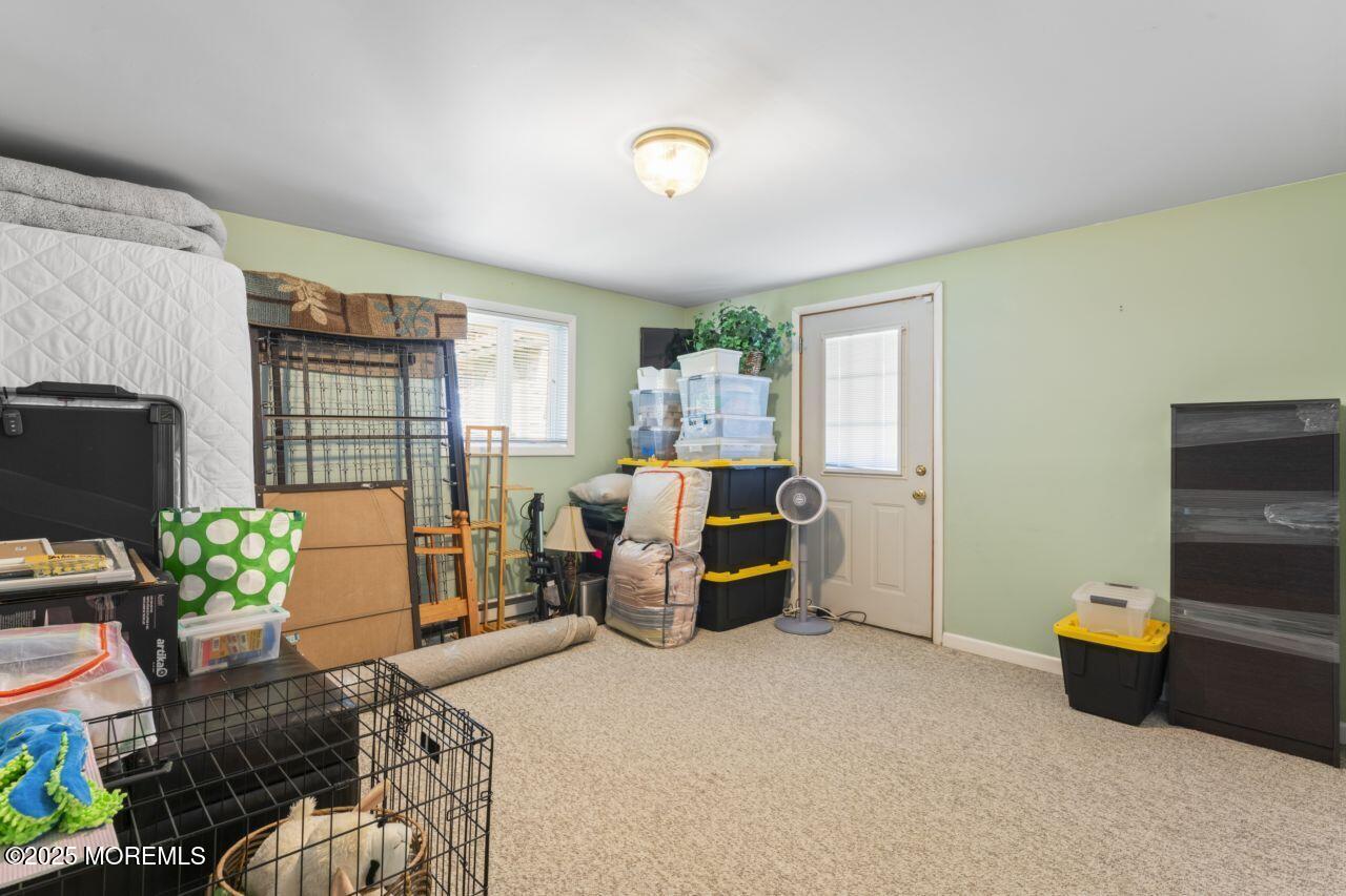 31 Cedar Avenue South Amboy, NJ 08879 - Photo 23 of 41 a bedroom with furniture and a flat screen tv