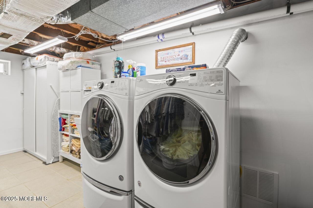 31 Cedar Avenue South Amboy, NJ 08879 - Photo 25 of 41 a utility room with dryer and washer