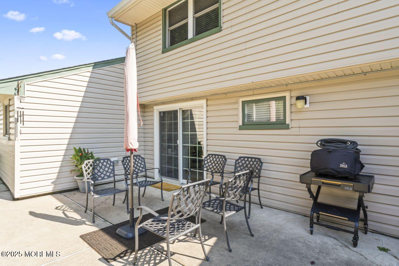 31 Cedar Avenue South Amboy, NJ 08879 - Photo 30 of 41 a view of a chairs and table in a patio