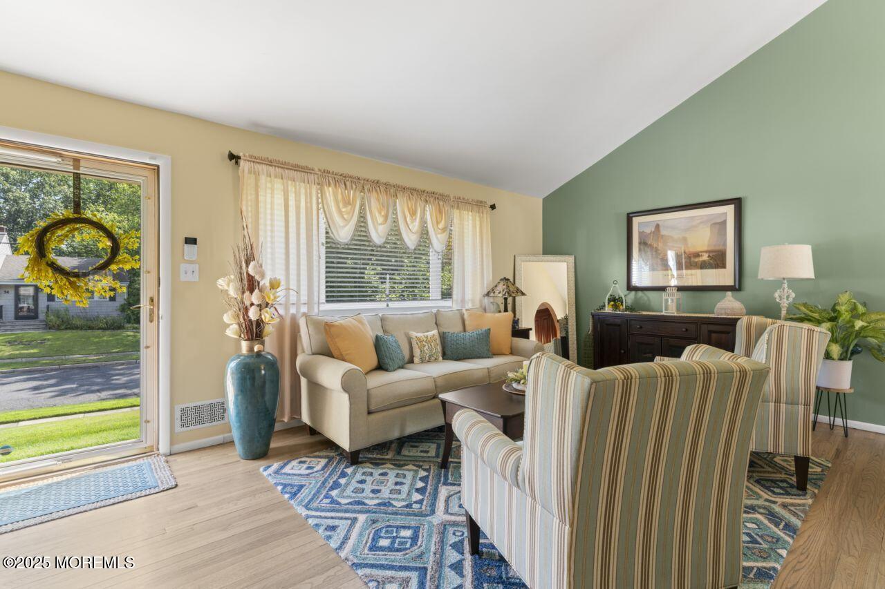 31 Cedar Avenue South Amboy, NJ 08879 - Photo 4 of 41 a living room with furniture and a large window