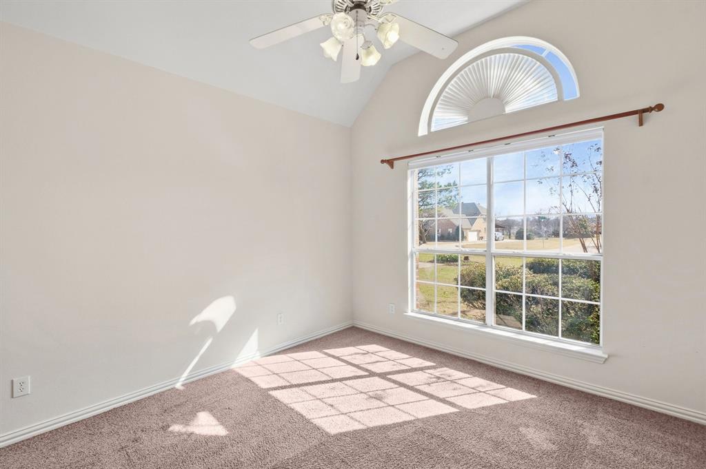 7517 Rodeo Drive Denton, TX 76208 - Photo 30 of 39 Bedroom #2 with front-facing window