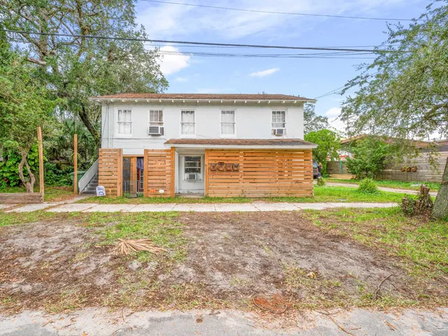 a view of a porch with wooden floor and outer view