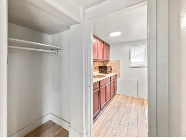 a view of an empty room and window