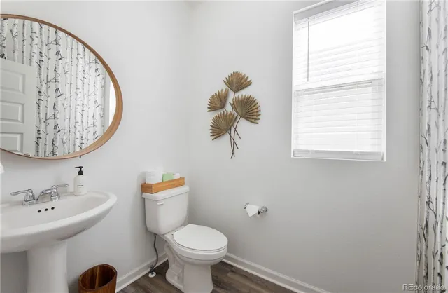 a view of a hallway with windows