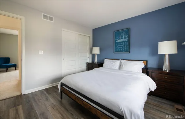 a utility room with cabinets washer and dryer