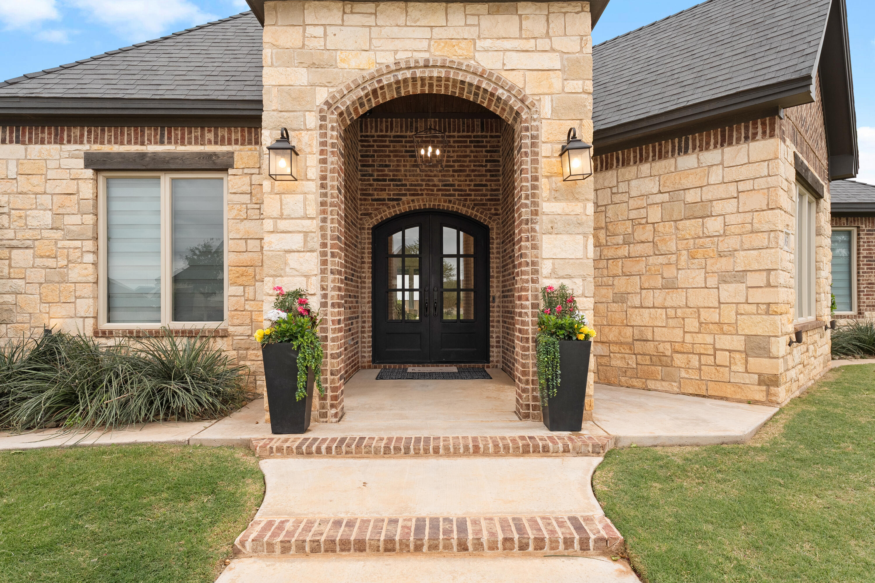 4003 140th Street Lubbock, TX 79423 - Photo 2 of 50 a view of entryway with garden