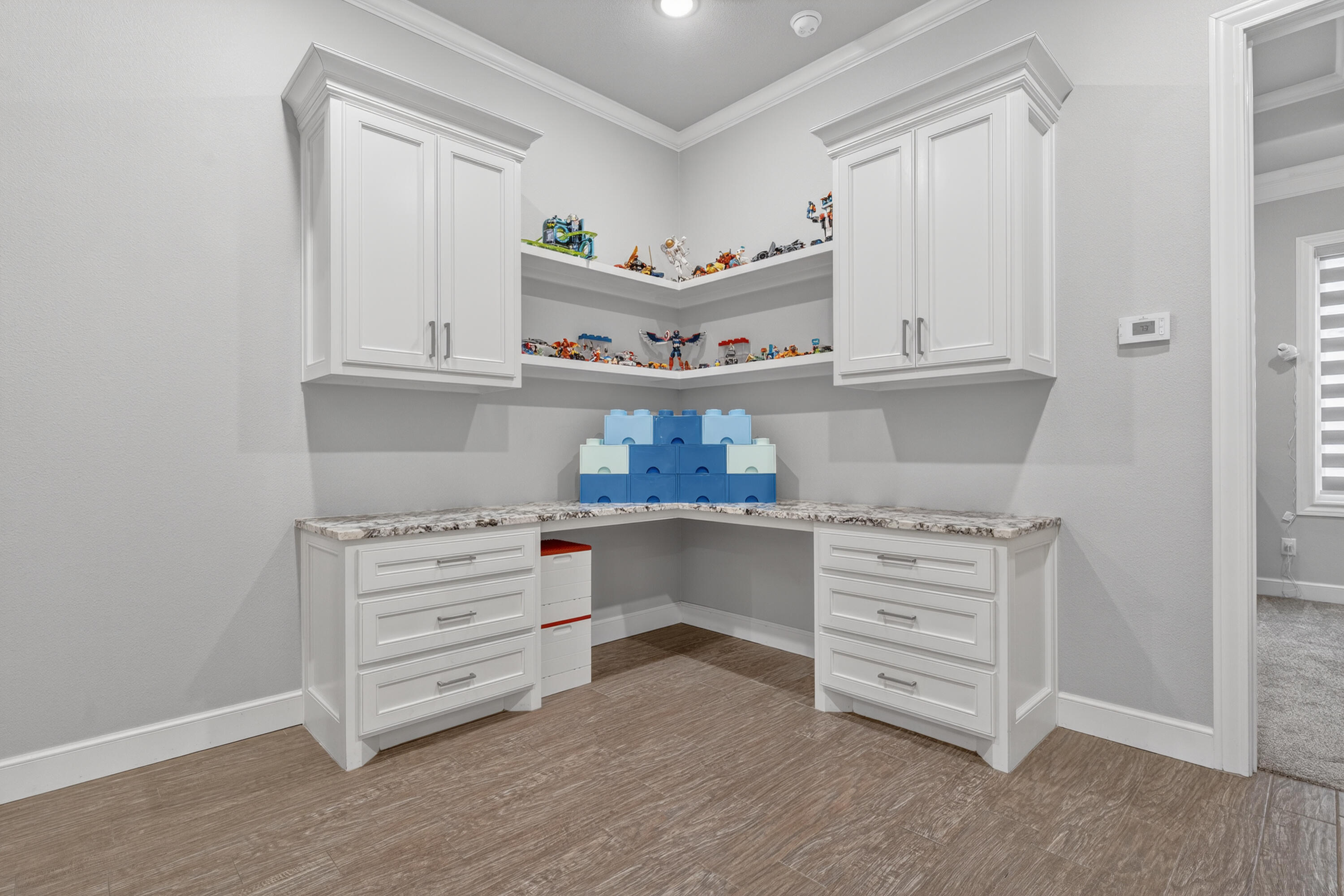 4003 140th Street Lubbock, TX 79423 - Photo 25 of 50 a kitchen with cabinets and window