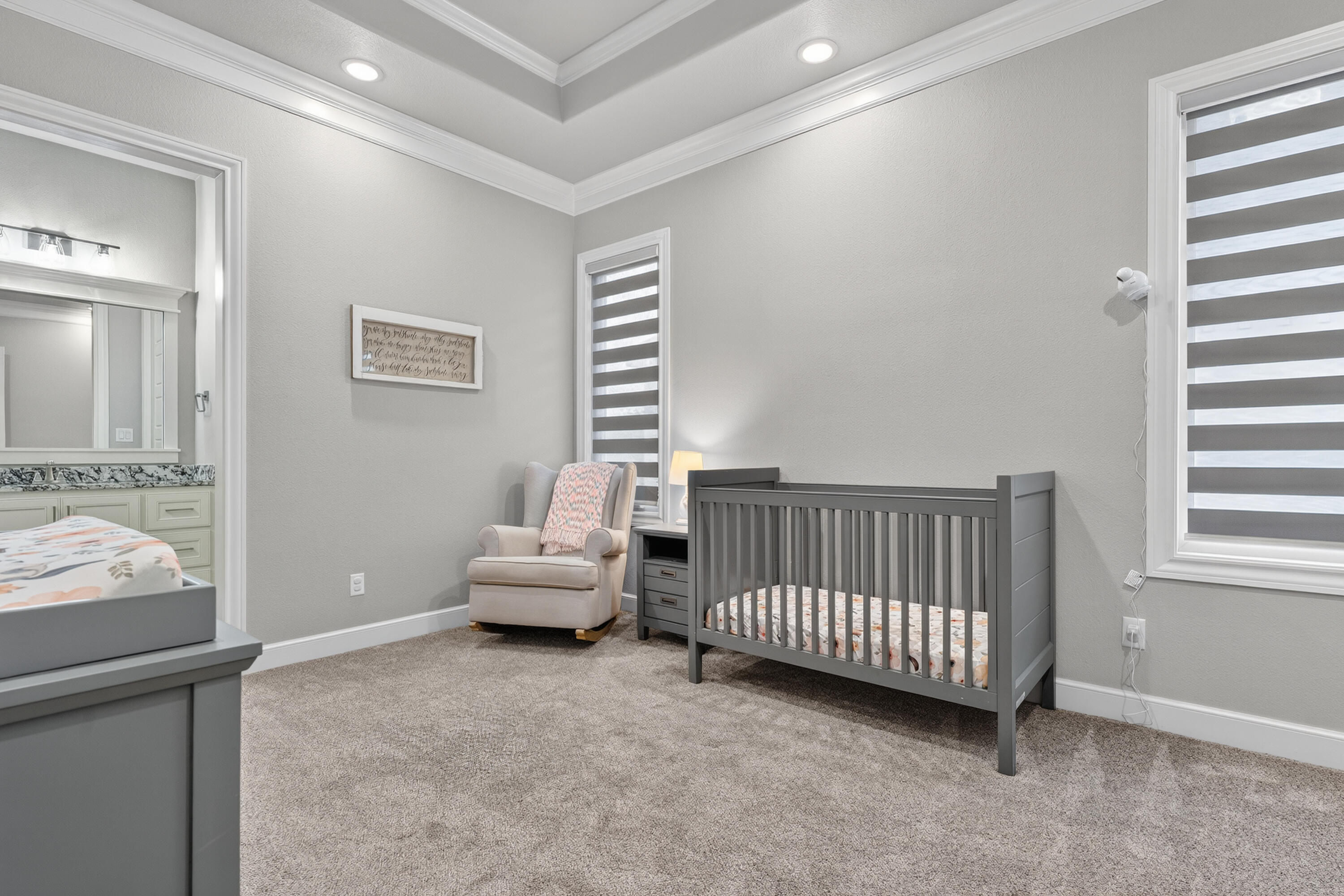 4003 140th Street Lubbock, TX 79423 - Photo 26 of 50 a view of a bedroom with furniture and windows