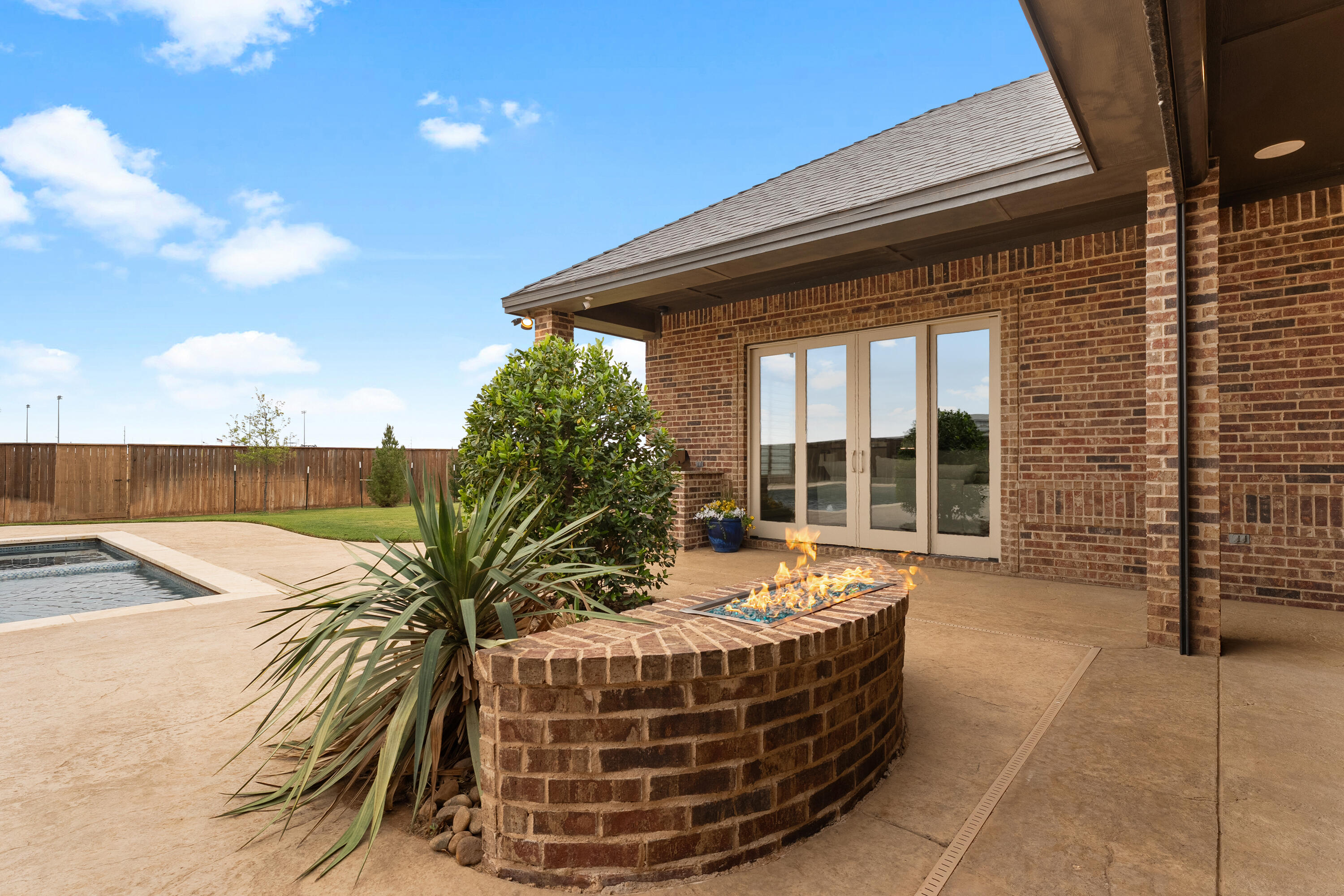 4003 140th Street Lubbock, TX 79423 - Photo 40 of 50 a building outdoor space with patio furniture and potted plants