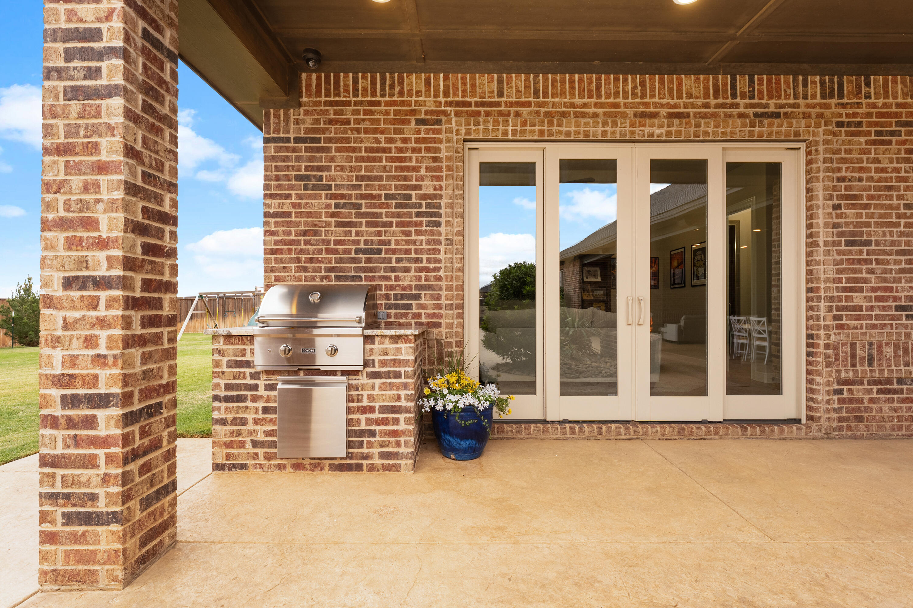4003 140th Street Lubbock, TX 79423 - Photo 45 of 50 a view of a blue house with a outdoor space