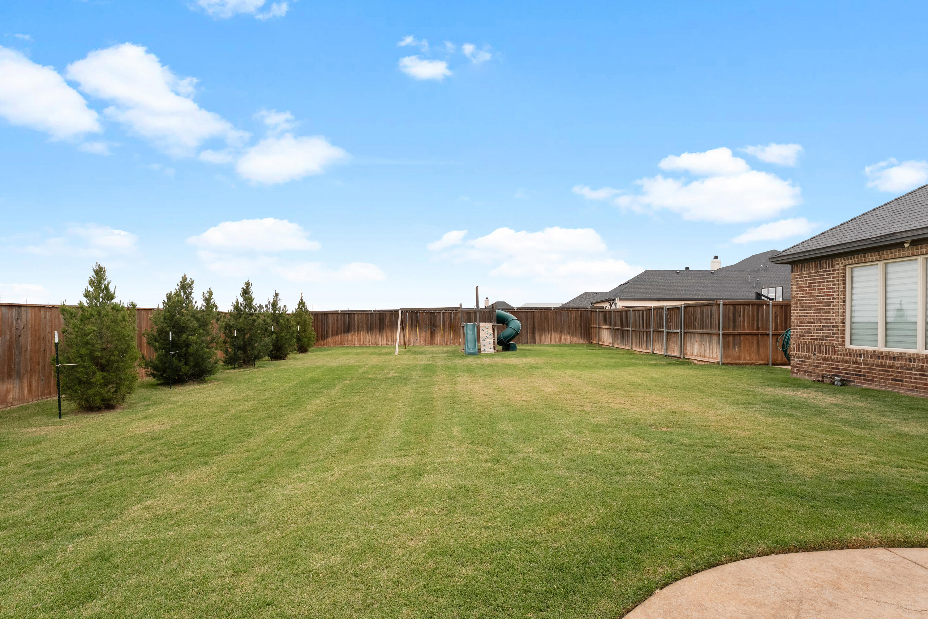 4003 140th Street Lubbock, TX 79423 - Photo 47 of 50 a view of a house with a yard