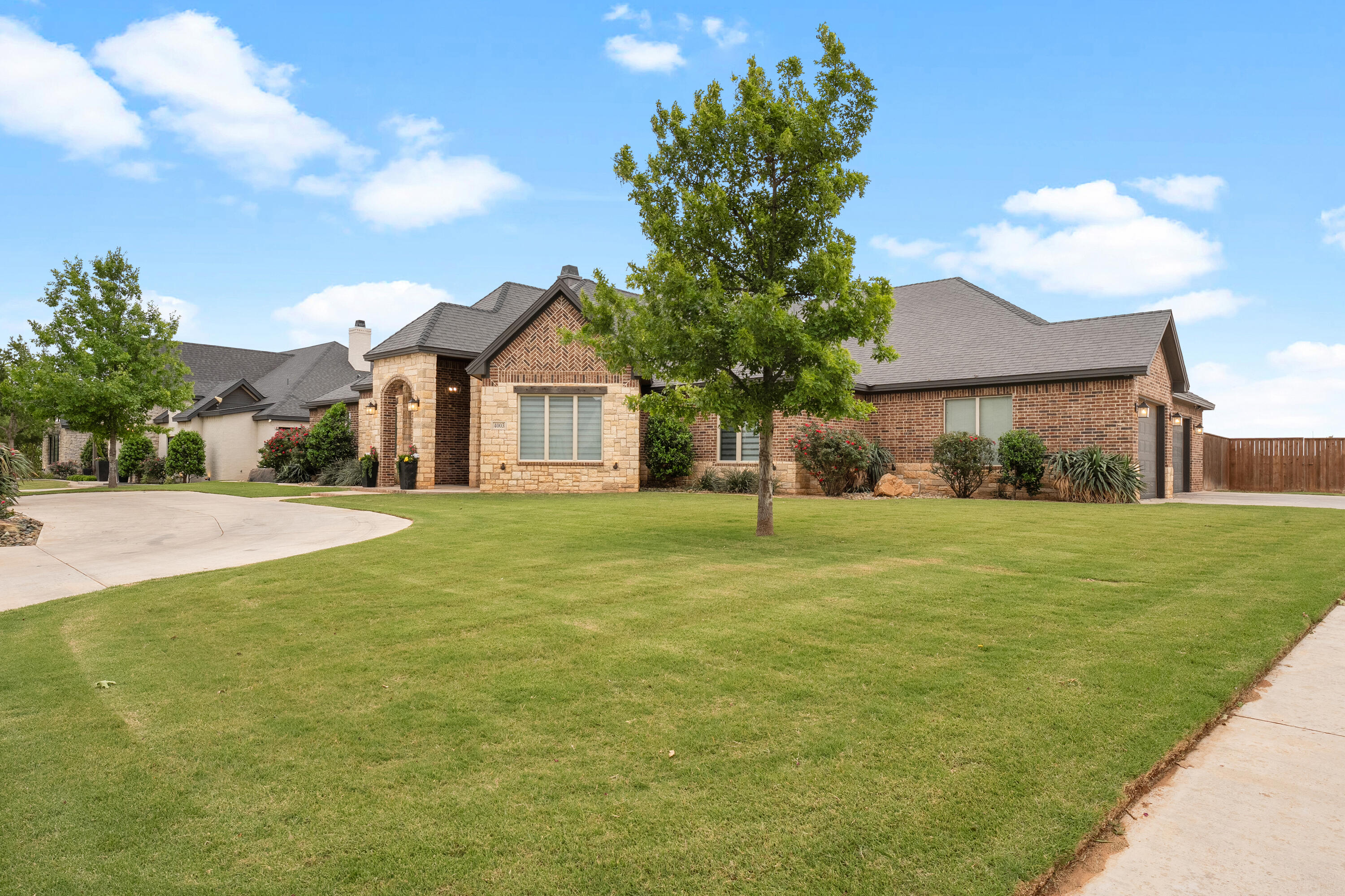 4003 140th Street Lubbock, TX 79423 - Photo 50 of 50 a front view of a house with a yard