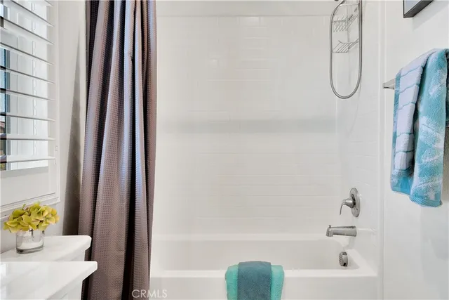 a view of a street with brick building