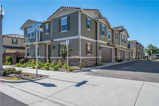 an aerial view of a city with lots of residential buildings