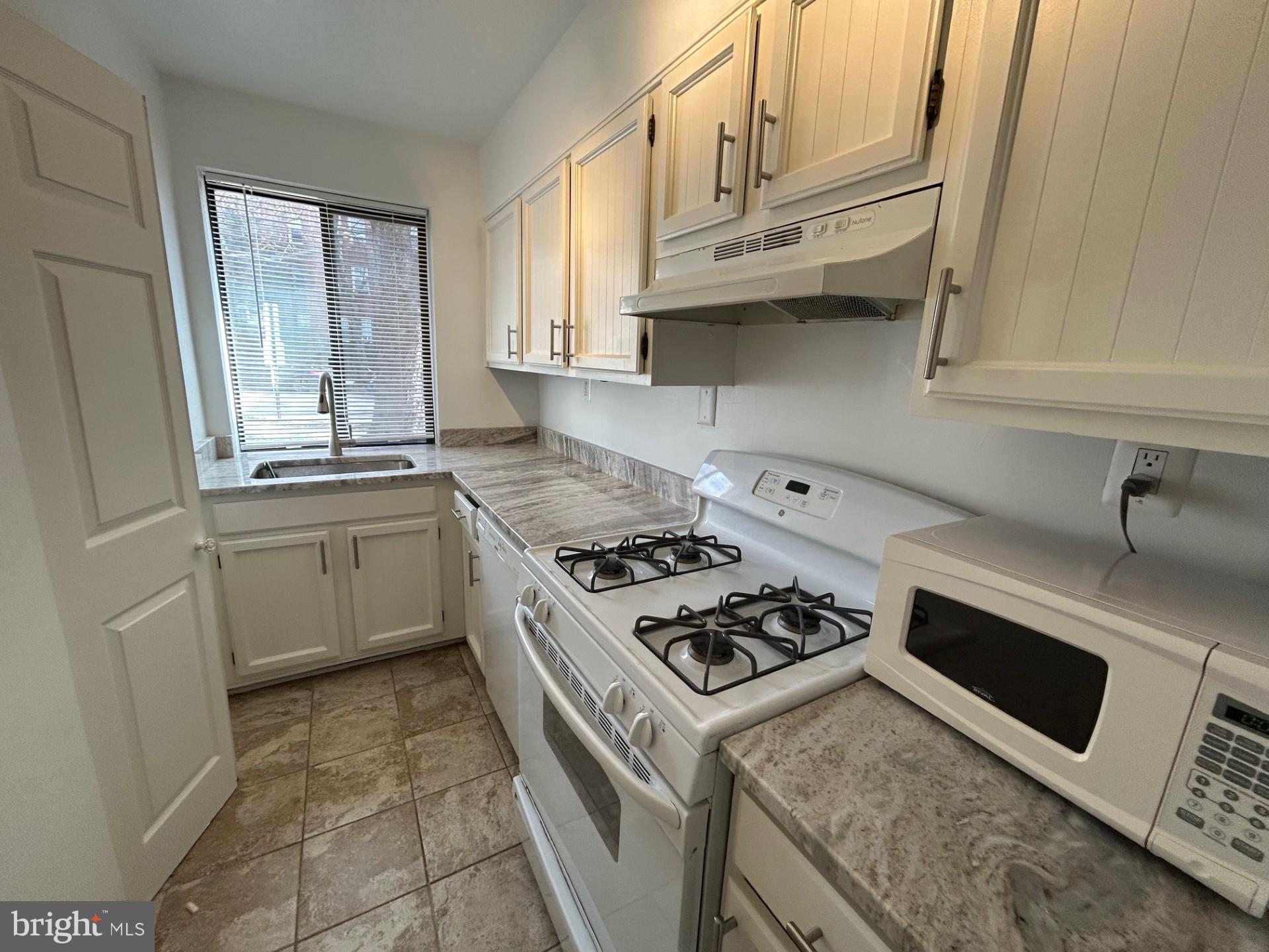 3815 Davis Place Northwest, Unit 1 Washington, DC 20007 - Photo 4 of 14 Charming kitchen with modern finishes.