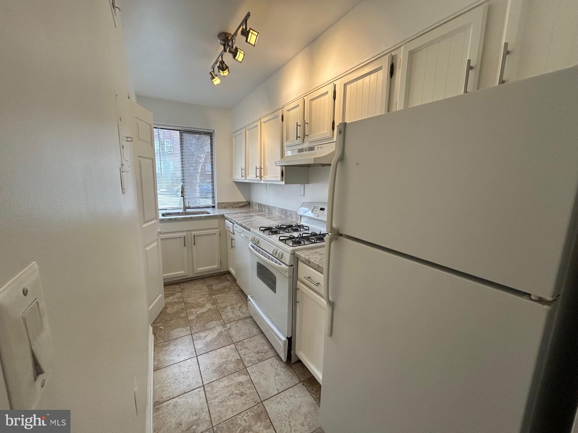3815 Davis Place Northwest, Unit 1 Washington, DC 20007 - Photo 6 of 14 Bright and functional kitchen space.