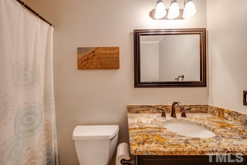 9909 Gralyn Road Raleigh, NC 27613 - Photo 14 of 29 DOWNSTAIRS FULL BATH