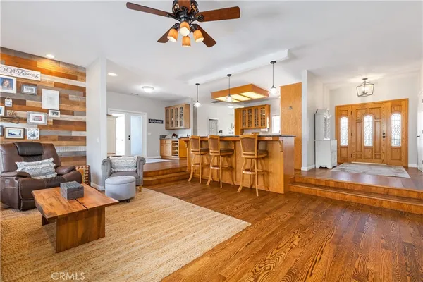 a kitchen with stainless steel appliances granite countertop a stove and a refrigerator
