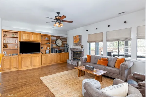 a view of a kitchen cabinets and wooden floor