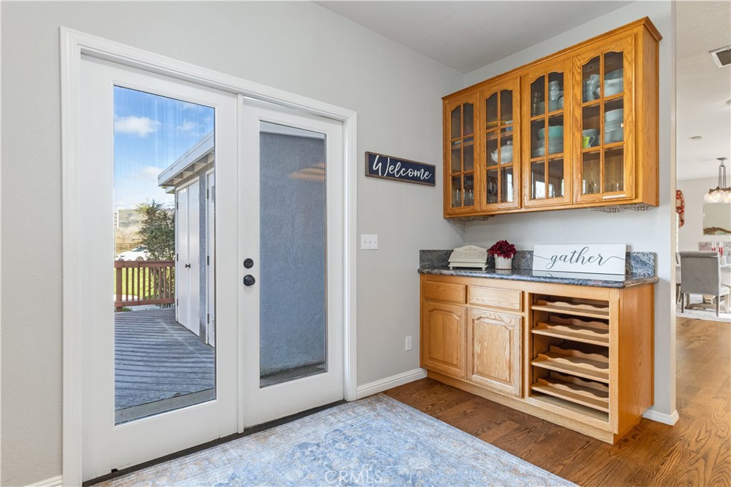 4375 Rustic Way San Luis Obispo, CA 93401 - Photo 28 of 65 a view of an entryway with wooden floor and door