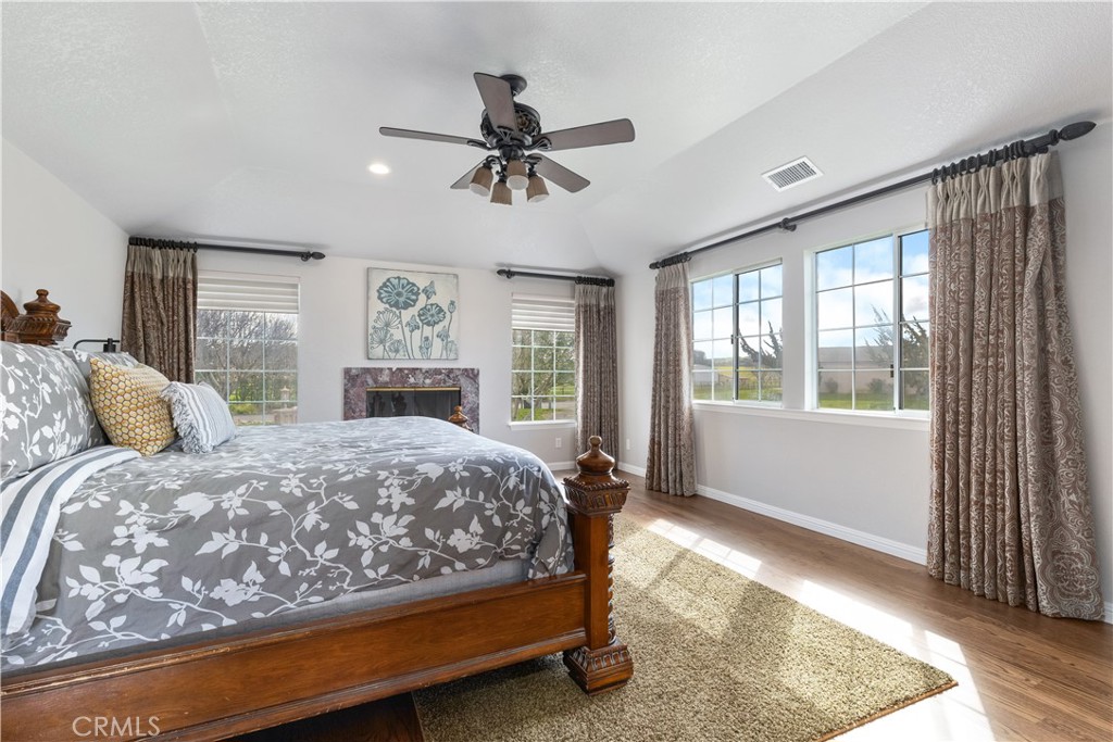 4375 Rustic Way San Luis Obispo, CA 93401 - Photo 29 of 65 a bedroom with a large bed and a window