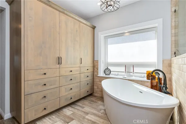 a utility room with a sink washer and dryer