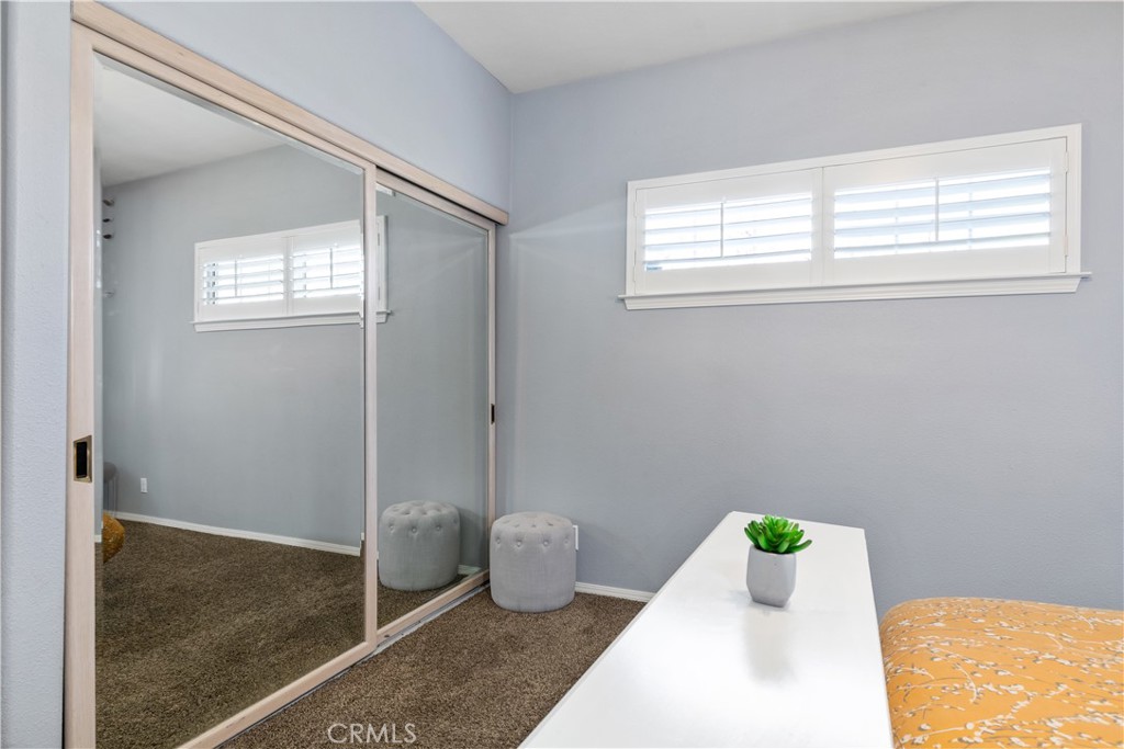 4375 Rustic Way San Luis Obispo, CA 93401 - Photo 38 of 65 a bathroom with a granite countertop sink and a toilet
