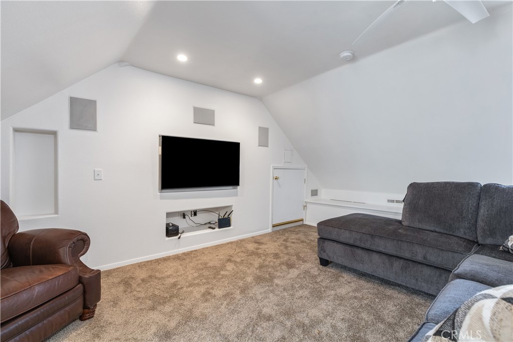 4375 Rustic Way San Luis Obispo, CA 93401 - Photo 46 of 65 a living room with furniture and a flat screen tv
