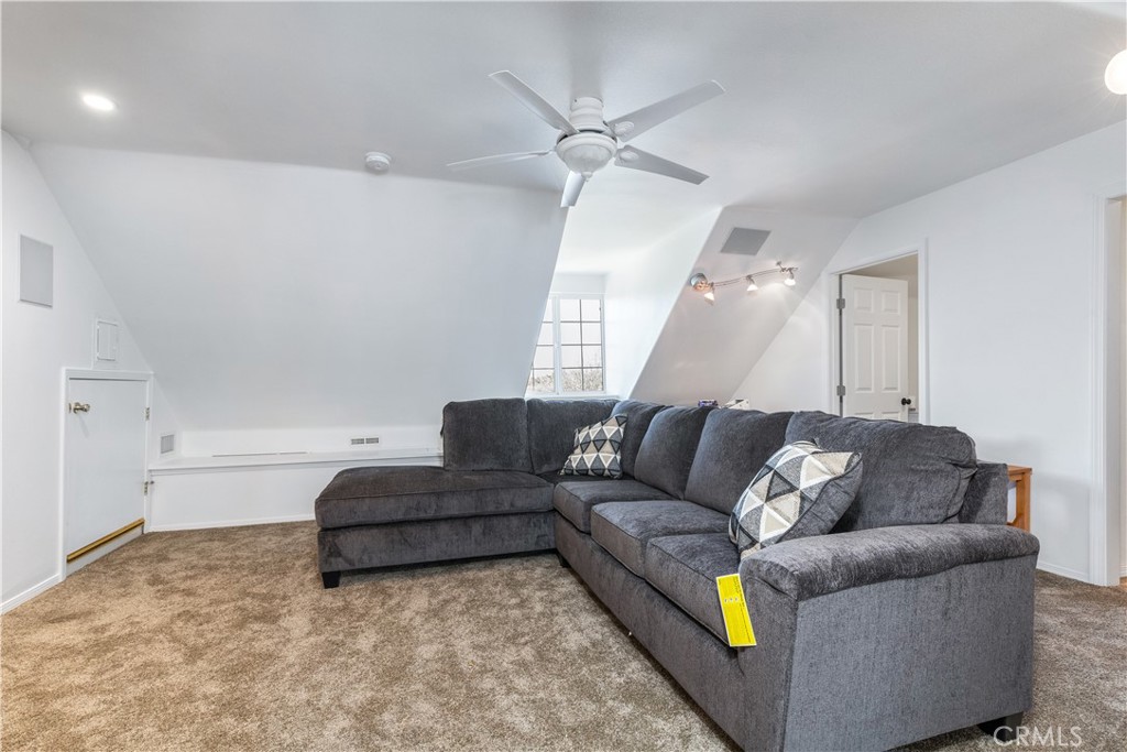 4375 Rustic Way San Luis Obispo, CA 93401 - Photo 47 of 65 a living room with furniture and a ceiling fan