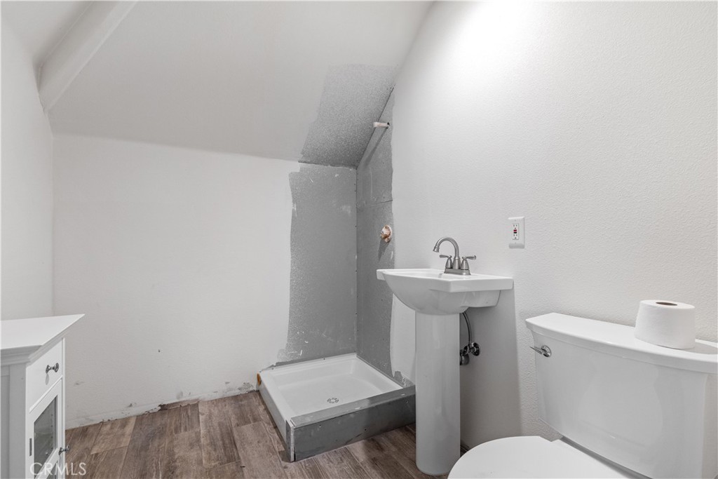 4375 Rustic Way San Luis Obispo, CA 93401 - Photo 49 of 65 a bathroom with a sink mirror toilet and shower