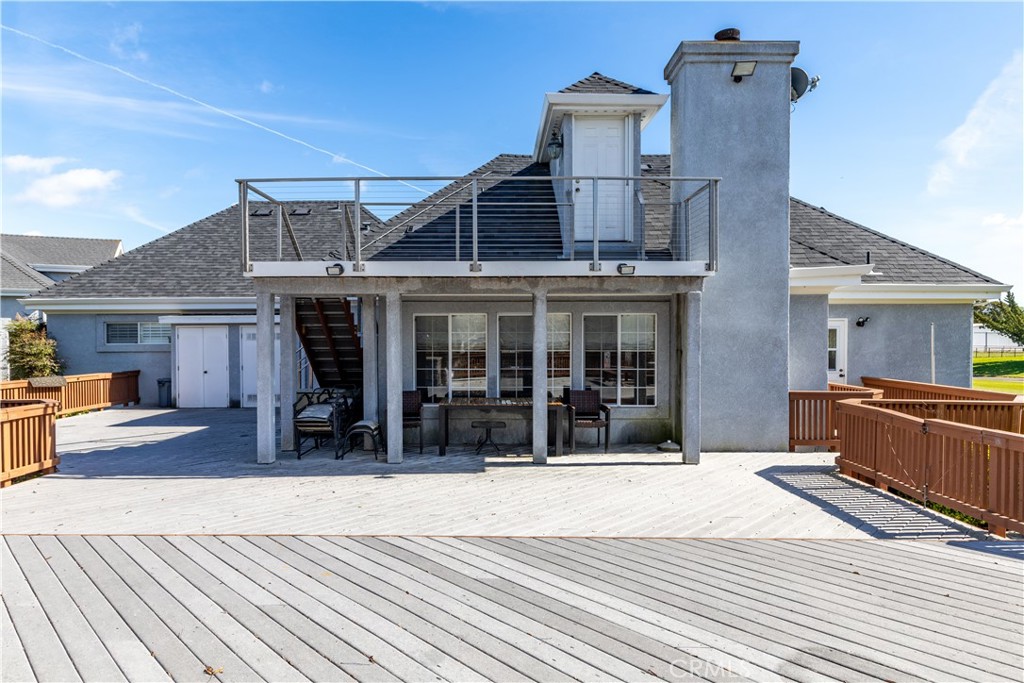 4375 Rustic Way San Luis Obispo, CA 93401 - Photo 53 of 65 a view of a house with a barbeque and wooden stairs